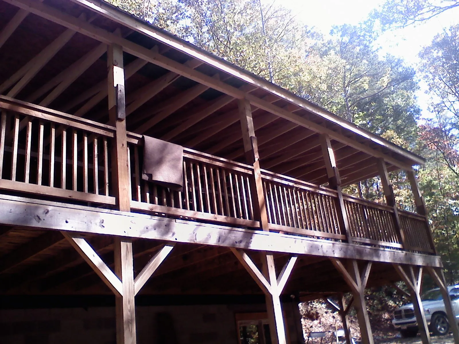 Timber framing under a new elevated porch and deck — Roof Leak Repair in Brice by Roofing Brothers